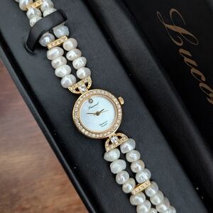 Vintage Lucoral Gold and Pearl Women's Watch